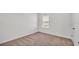 Empty bedroom with carpet flooring and a window at 935 Waterville Dr, Auburndale, FL 33823