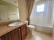 Clean bathroom with shower/tub combo and vanity at 2556 Ladoga Dr, Lakeland, FL 33805