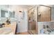 Main bathroom with large shower, garden tub and double vanity at 2556 Ladoga Dr, Lakeland, FL 33805