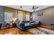 Gathering room featuring a sectional sofa and large windows at 2556 Ladoga Dr, Lakeland, FL 33805