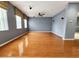 Large Gathering room with hardwood floors and lots of natural light at 2556 Ladoga Dr, Lakeland, FL 33805