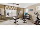 Home gym with various equipment including weights and cardio at 2556 Ladoga Dr, Lakeland, FL 33805