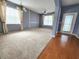 Spacious living room with hardwood and carpeted floors at 2556 Ladoga Dr, Lakeland, FL 33805