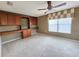 Bright office featuring built-in wooden desk and shelving at 2556 Ladoga Dr, Lakeland, FL 33805