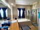 Elegant bathroom featuring double sink vanity, soaking tub, walk-in shower and stylish accents at 2712 Oak Hammock Loop, Mulberry, FL 33860