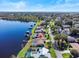 Scenic aerial showcasing waterfront homes, private docks, and access to lake at 288 Hernando Rd, Winter Haven, FL 33884