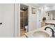 Bathroom featuring tiled shower, and a vanity with lots of counter space at 288 Hernando Rd, Winter Haven, FL 33884