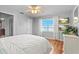 Bedroom boasts natural light with a view, complemented by hardwood floors at 288 Hernando Rd, Winter Haven, FL 33884