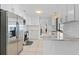Well-lit kitchen with stainless steel appliances and white tile backsplash at 288 Hernando Rd, Winter Haven, FL 33884