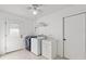 Functional laundry room with modern machines and ample storage at 288 Hernando Rd, Winter Haven, FL 33884