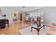 Bright living room showcasing hardwood floors, comfortable seating, and a welcoming atmosphere at 288 Hernando Rd, Winter Haven, FL 33884