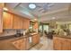 Open kitchen with island and view into adjacent dining area at 2943 Plantation Rd, Winter Haven, FL 33884