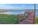 Wooden community boat dock extending into the lake at 4092 Carteret Dr, Winter Haven, FL 33884