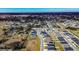 Aerial view of a residential neighborhood with a focus on a single home at 4364 Reding Way, Lakeland, FL 33813