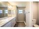 Bathroom with double vanity and a large walk-in shower at 4364 Reding Way, Lakeland, FL 33813