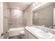 Clean bathroom with a bathtub, toilet and vanity at 4364 Reding Way, Lakeland, FL 33813