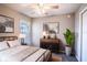 Cozy bedroom with a queen-size bed and stylish decor at 4364 Reding Way, Lakeland, FL 33813