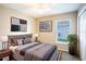 Guest bedroom with a queen-size bed and ample closet space at 4364 Reding Way, Lakeland, FL 33813