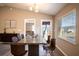 Dining room with a concrete table and brown leather chairs at 4364 Reding Way, Lakeland, FL 33813
