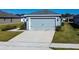 House exterior view from the driveway at 4364 Reding Way, Lakeland, FL 33813