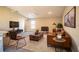 Relaxing living room featuring a leather sofa and accent chair at 4364 Reding Way, Lakeland, FL 33813