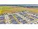 This community features tidy homes on landscaped lots in close proximity to a lake and open fields at 566 Valentina Ln, Auburndale, FL 33823