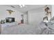 Bedroom featuring a comfortable bed, dresser, closet, and decorative wall hangings at 566 Valentina Ln, Auburndale, FL 33823