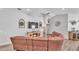 Inviting living room with a comfortable leather sofa, fireplace, and modern décor at 566 Valentina Ln, Auburndale, FL 33823