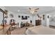 Relaxing main bedroom showcasing a stylish display shelf and dresser at 566 Valentina Ln, Auburndale, FL 33823