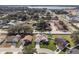 An aerial view highlights the neighborhood, nearby lake, and convenient access to roads at 5808 Driftwood Dr, Winter Haven, FL 33884