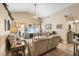 Spacious living room with high ceilings, a ceiling fan, and comfortable seating at 5808 Driftwood Dr, Winter Haven, FL 33884