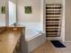 Bathroom with corner bathtub and shower at 1333 Rebecca Dr, Haines City, FL 33844