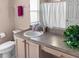 Bathroom with vanity, toilet and shower/tub combo at 1333 Rebecca Dr, Haines City, FL 33844
