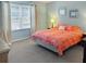 Primary bedroom with king-size bed and neutral decor at 1333 Rebecca Dr, Haines City, FL 33844