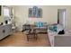 Living room with beige sofas and a large TV at 1333 Rebecca Dr, Haines City, FL 33844