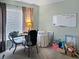 Home office with a desk, chair, and whiteboard at 1333 Rebecca Dr, Haines City, FL 33844