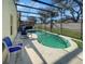 Relaxing pool area with patio furniture at 1333 Rebecca Dr, Haines City, FL 33844