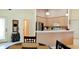 Dining area view showing an open layout with an eat-in kitchen bar at 4101 Limerick Dr, Lake Wales, FL 33859