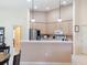 Spacious kitchen featuring light wood cabinets and modern appliances at 4101 Limerick Dr, Lake Wales, FL 33859