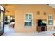 Covered lanai with tile flooring, ceiling fan, and view into other rooms at 4101 Limerick Dr, Lake Wales, FL 33859