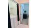 Convenient laundry area with modern appliances and tiled floors, adjacent to a study space at 4101 Limerick Dr, Lake Wales, FL 33859