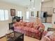 Open concept living room with views of a kitchen and dining room, and neutral paint at 4101 Limerick Dr, Lake Wales, FL 33859