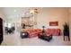 Open-concept living area with tile floors seamlessly connects the kitchen, dining, and lounge spaces at 4101 Limerick Dr, Lake Wales, FL 33859