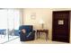 Comfortable living room with stylish furnishings and access to the outdoor patio at 4101 Limerick Dr, Lake Wales, FL 33859