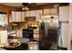 Modern kitchen with stainless steel appliances and granite countertops at 5031 Timberlane Rd, Lake Wales, FL 33898