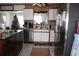 Bright kitchen with stainless steel appliances and an island at 5031 Timberlane Rd, Lake Wales, FL 33898