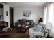 Cozy living room featuring comfortable seating and a wood coffee table at 5031 Timberlane Rd, Lake Wales, FL 33898