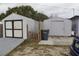 Two storage sheds with a gate at 5031 Timberlane Rd, Lake Wales, FL 33898