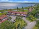 Aerial view of townhouses near a lake with ample parking at 802 Magnolia Pl, Winter Haven, FL 33884