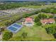 Community amenities: a pool and tennis courts, near shopping, dining, and main routes for convenient access to everything at 802 Magnolia Pl, Winter Haven, FL 33884